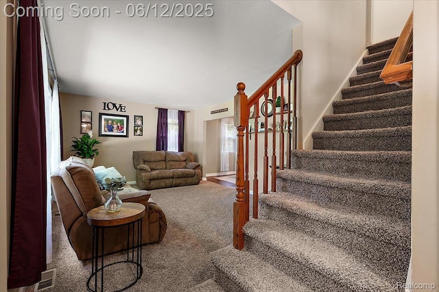 5836 Ewalt Rd, Imlay City, MI 48444 - carpeted living room featuring stairway