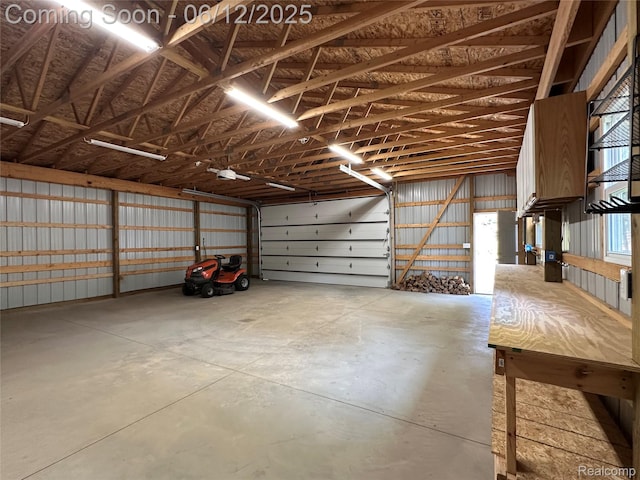5836 Ewalt Rd, Imlay City, MI 48444 - garage featuring a garage door opener