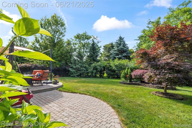 7244 Millrock Ave, Shelby Twp, MI 48317 - view of green lawn featuring a patio