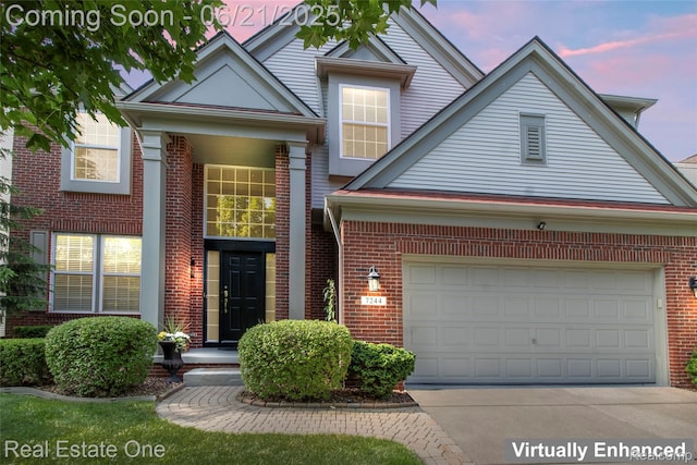 7244 Millrock Ave, Shelby Twp, MI 48317 - traditional-style home with brick siding, driveway, and an attached garage