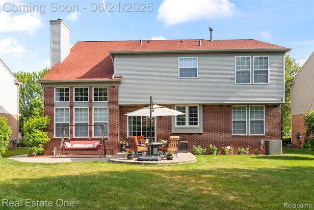 7244 Millrock Ave, Shelby Twp, MI 48317 - rear view of house with a patio, a yard, brick siding, a chimney, and an outdoor living space