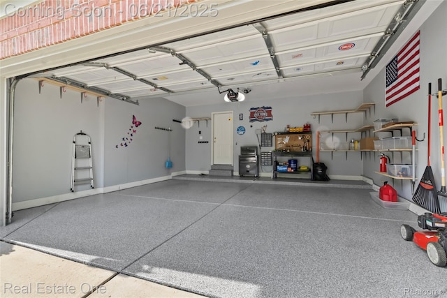 7244 Millrock Ave, Shelby Twp, MI 48317 - garage with a garage door opener and baseboards