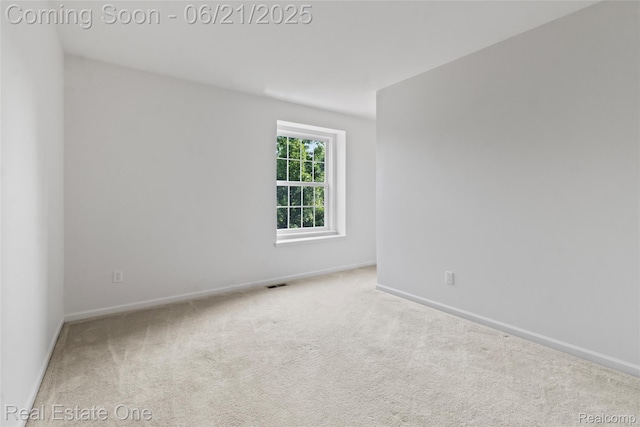 7244 Millrock Ave, Shelby Twp, MI 48317 - carpeted empty room with baseboards