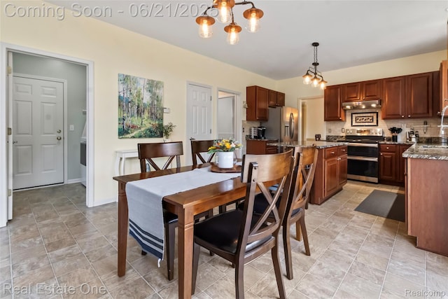 7244 Millrock Ave, Shelby Twp, MI 48317 - dining space featuring a chandelier