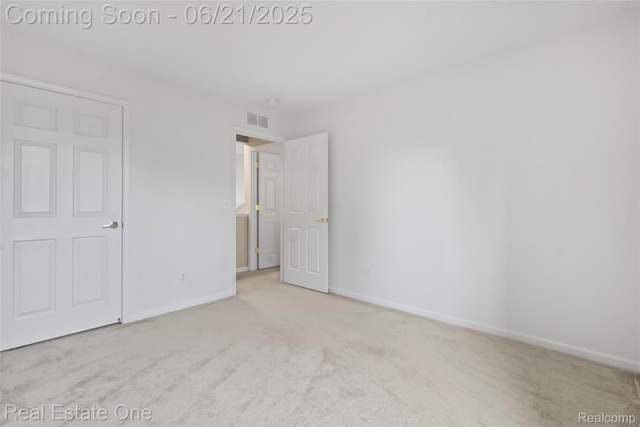 7244 Millrock Ave, Shelby Twp, MI 48317 - unfurnished bedroom featuring carpet flooring and baseboards