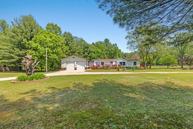 3858 S Chestnut Ave, Newaygo, MI 49337 - ranch-style home featuring driveway, an outdoor structure, a front yard, and a deck
