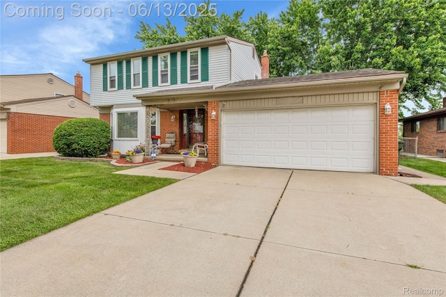 3039 Elmcrest Rd, Sterling Heights, MI 48310 - view of front of house with brick siding, concrete driveway, a front yard, and a chimney