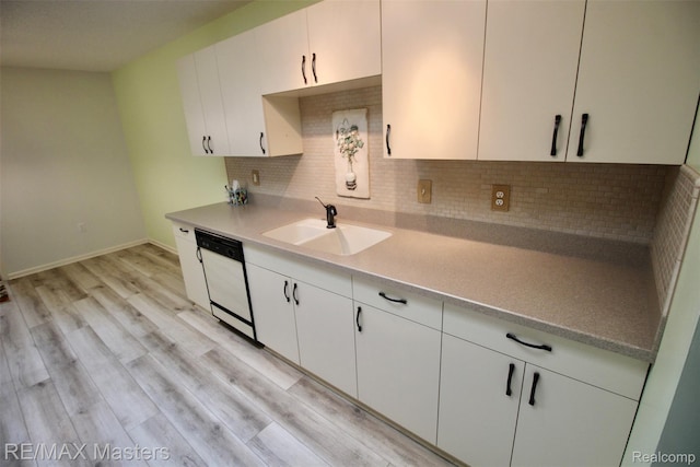 19270 Otto Ct, New Boston, MI 48164 - kitchen with white dishwasher, tasteful backsplash, light wood-type flooring, white cabinetry, and light countertops