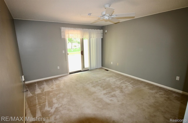 19270 Otto Ct, New Boston, MI 48164 - carpeted spare room featuring a ceiling fan and baseboards
