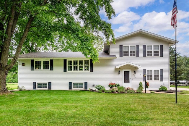 5549 Newton Ave, Coloma, MI 49038 - split level home featuring a front lawn