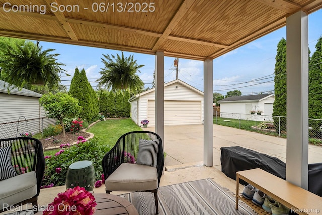 122 N Wilson Ave, Royal Oak, MI 48067 - view of patio with a detached garage and an outdoor structure