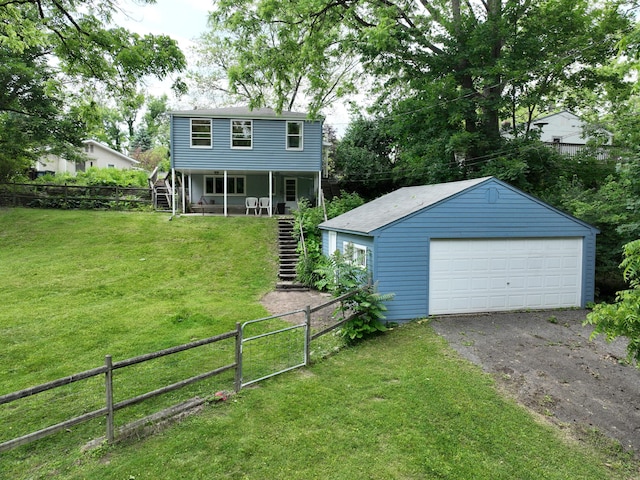 601 Cressfield Ln, Ann Arbor, MI 48103 - view of front of home with stairs, an outbuilding, and a detached garage