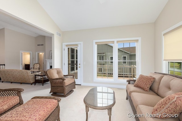 971 Aberdeen Way, Hudsonville, MI 49426 - living area featuring carpet flooring, high vaulted ceiling, and a fireplace