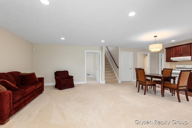 971 Aberdeen Way, Hudsonville, MI 49426 - living room featuring stairway, recessed lighting, and light carpet