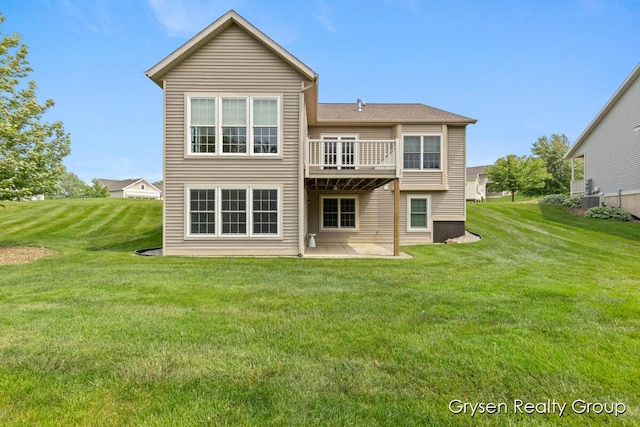 971 Aberdeen Way, Hudsonville, MI 49426 - rear view of house with a patio, a lawn, and a deck