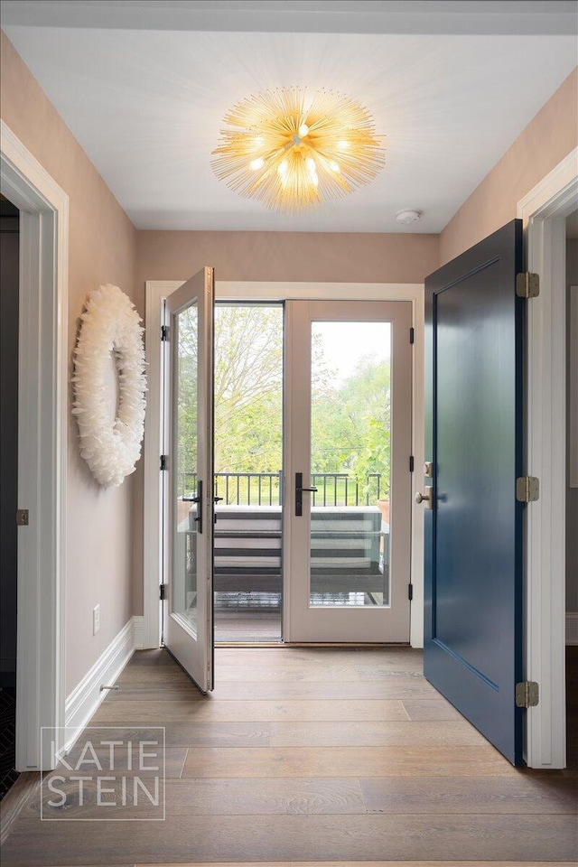 1110 Breton Rd SE, East Grand Rapids, MI 49506 - foyer with wood finished floors