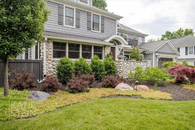 1110 Breton Rd SE, East Grand Rapids, MI 49506 - view of front of property featuring an attached garage and stone siding