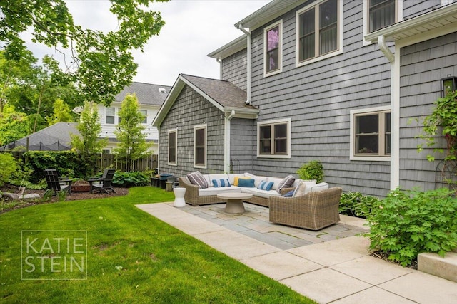 1110 Breton Rd SE, East Grand Rapids, MI 49506 - view of patio / terrace featuring an outdoor living space with a fire pit