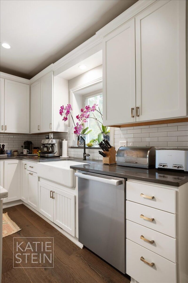 1110 Breton Rd SE, East Grand Rapids, MI 49506 - kitchen with stainless steel dishwasher, dark wood-style flooring, decorative backsplash, white cabinets, and recessed lighting