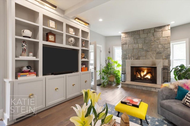 1110 Breton Rd SE, East Grand Rapids, MI 49506 - living area featuring dark wood-type flooring and a fireplace