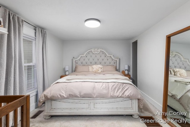 821 W Baseline Rd, Plainwell, MI 49080 - bedroom with carpet and baseboards