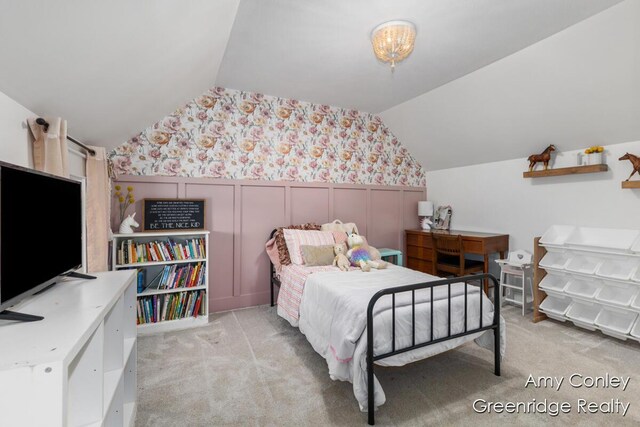821 W Baseline Rd, Plainwell, MI 49080 - bedroom featuring wallpapered walls, lofted ceiling, wainscoting, light colored carpet, and a decorative wall