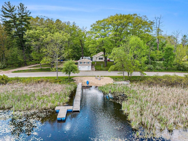 5729 N Bass Lake Rd, Irons, MI 49644 - dock area with a water view