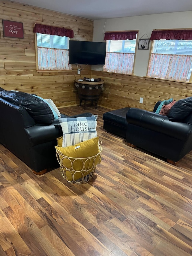 5729 N Bass Lake Rd, Irons, MI 49644 - living room with wooden walls and wood finished floors