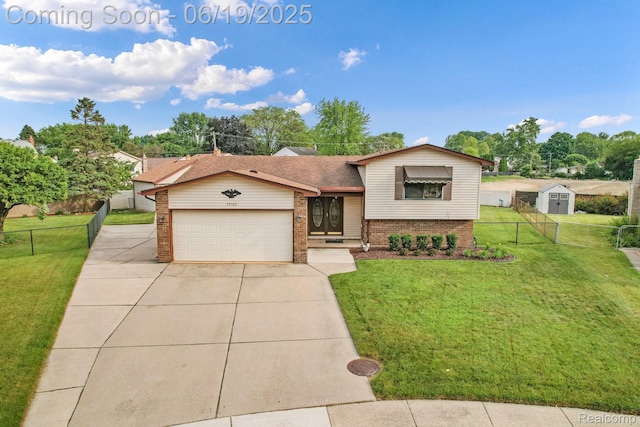39502 Salvatore Dr, Sterling Heights, MI 48313 - split level home featuring brick siding, a garage, and concrete driveway