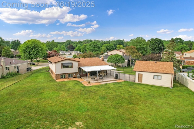39502 Salvatore Dr, Sterling Heights, MI 48313 - rear view of property with a patio, a fenced backyard, an outbuilding, and brick siding