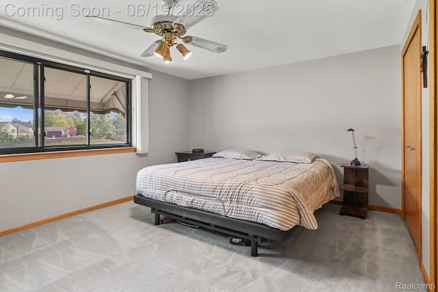 39502 Salvatore Dr, Sterling Heights, MI 48313 - bedroom featuring light colored carpet, a closet, and a ceiling fan