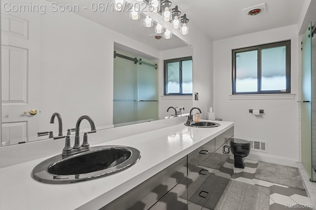 39502 Salvatore Dr, Sterling Heights, MI 48313 - full bathroom featuring double vanity, an enclosed shower, and tile patterned floors