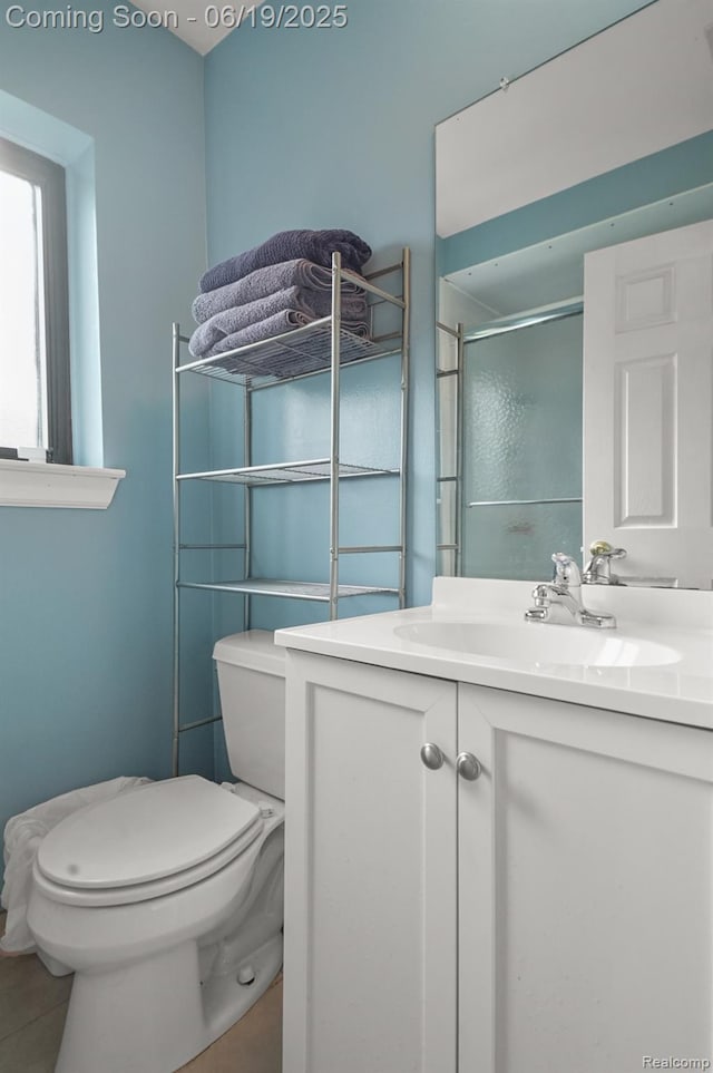 39502 Salvatore Dr, Sterling Heights, MI 48313 - full bath featuring vanity, a stall shower, and tile patterned floors