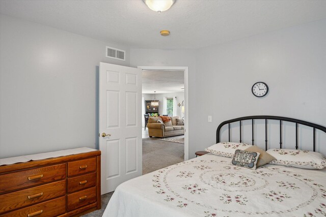 340 E 4th St, Onsted, MI 49265 - bedroom with dark carpet