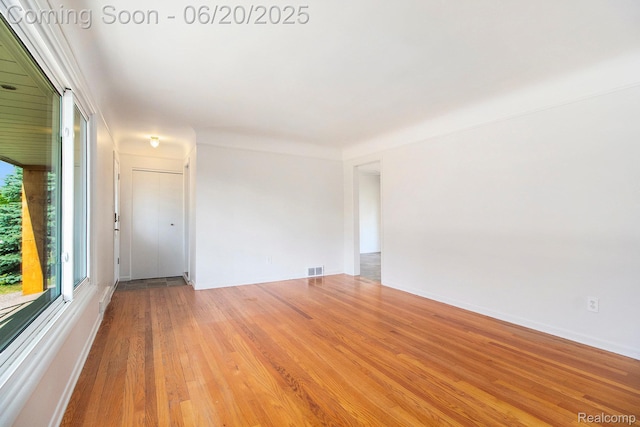 29424 Oakley St, Livonia, MI 48154 - empty room with wood finished floors and baseboards