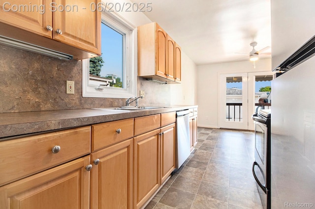 29424 Oakley St, Livonia, MI 48154 - kitchen featuring stainless steel appliances, ceiling fan, healthy amount of natural light, and decorative backsplash