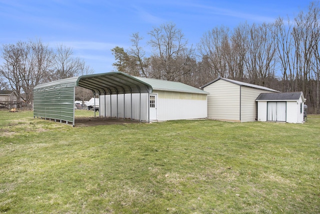 144 E Hickory Rd, Battle Creek, MI 49017 - view of shed featuring a carport