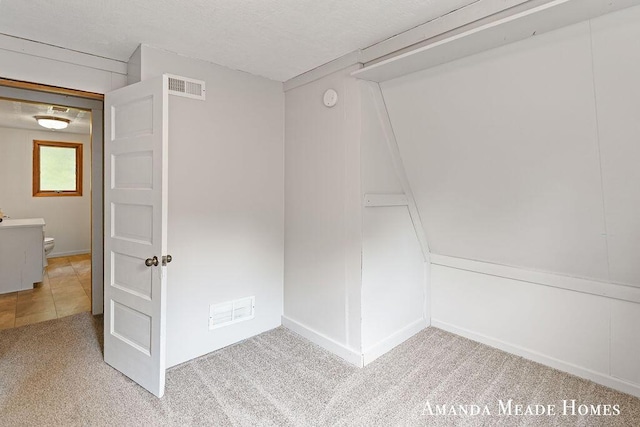443 Nicholson St, Ionia, MI 48846 - unfurnished room with light colored carpet and a smoke detector