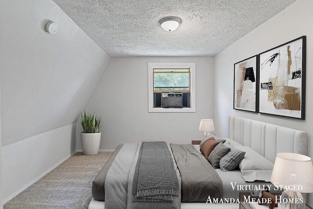 443 Nicholson St, Ionia, MI 48846 - bedroom with carpet floors, cooling unit, and a textured ceiling