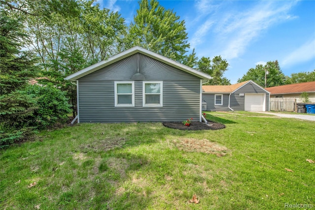 35246 Lewis St, Canton, MI 48185 - view of side of property with concrete driveway and an outbuilding