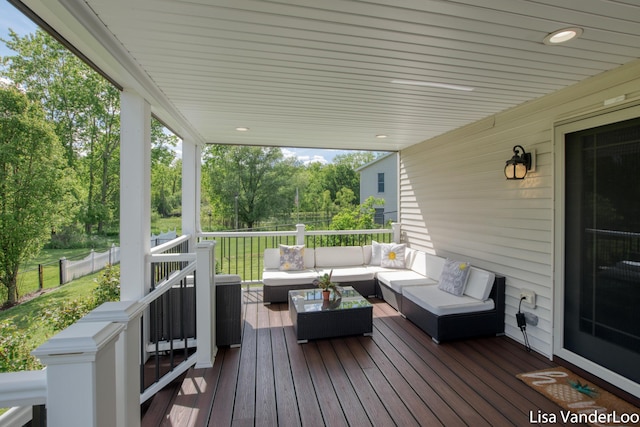 1706 Steff Ct SW, Wyoming, MI 49519 - deck with an outdoor hangout area and view of wooded area