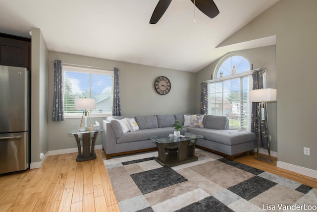 1706 Steff Ct SW, Wyoming, MI 49519 - living room featuring light wood finished floors, a ceiling fan, and lofted ceiling