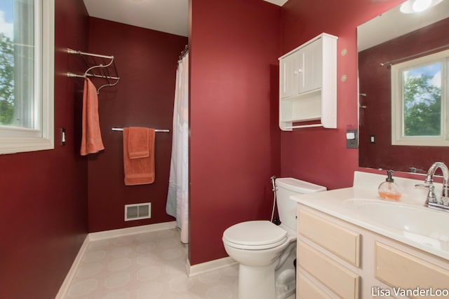 1706 Steff Ct SW, Wyoming, MI 49519 - full bathroom with vanity, tile patterned floors, and curtained shower