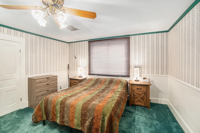 16 E Pine St, Fremont, MI 49412 - carpeted bedroom featuring wallpapered walls, a wainscoted wall, ceiling fan, and crown molding