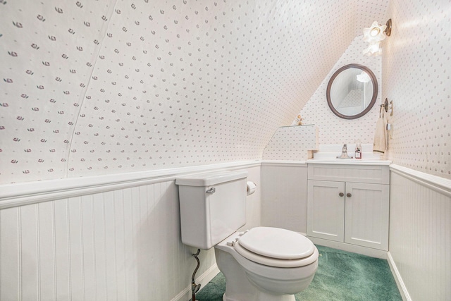 16 E Pine St, Fremont, MI 49412 - half bath with wallpapered walls, wainscoting, and vanity