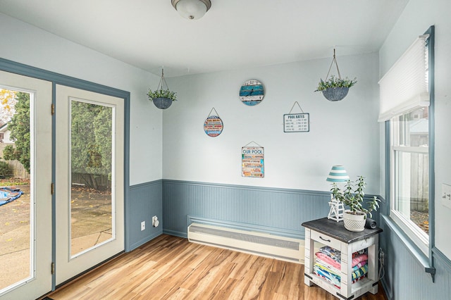 16 E Pine St, Fremont, MI 49412 - dining room featuring wood finished floors and wainscoting