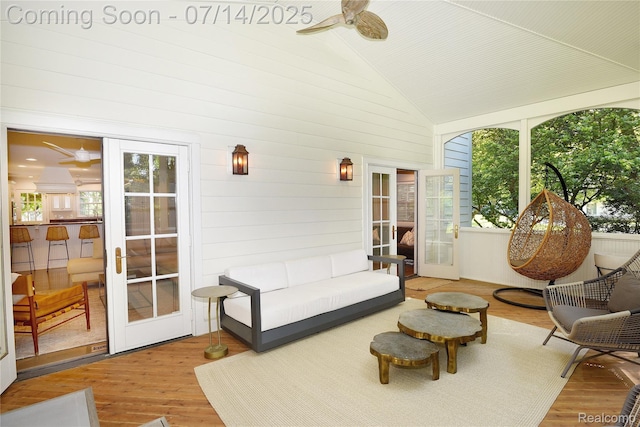 32965 Franklin Ct, Franklin, MI 48025 - sunroom featuring wood finished floors, high vaulted ceiling, a deck, french doors, and wood walls