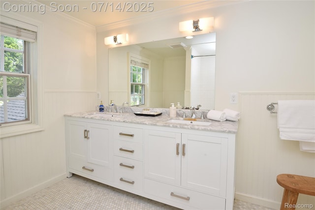 32965 Franklin Ct, Franklin, MI 48025 - full bathroom featuring double vanity, healthy amount of natural light, crown molding, wainscoting, and tile patterned flooring