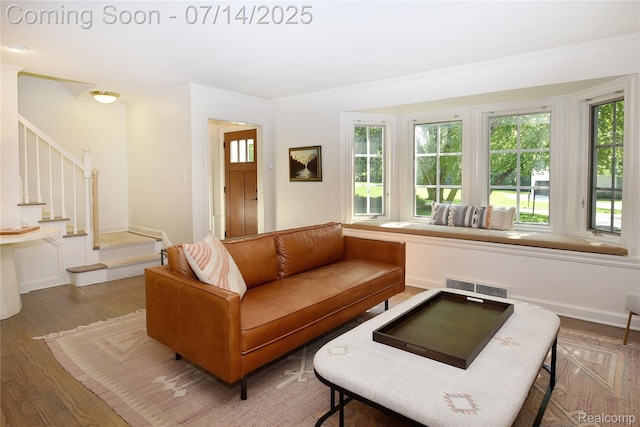 32965 Franklin Ct, Franklin, MI 48025 - living area with wood finished floors, stairway, and crown molding