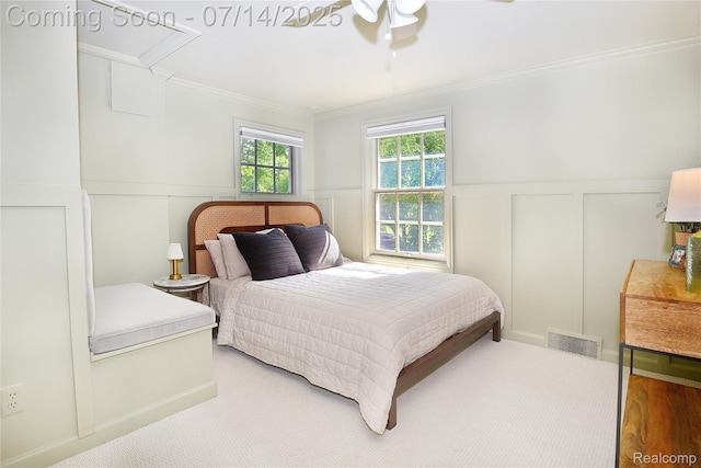 32965 Franklin Ct, Franklin, MI 48025 - carpeted bedroom featuring a decorative wall, crown molding, and a wainscoted wall